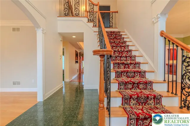 a view of entryway with a front door