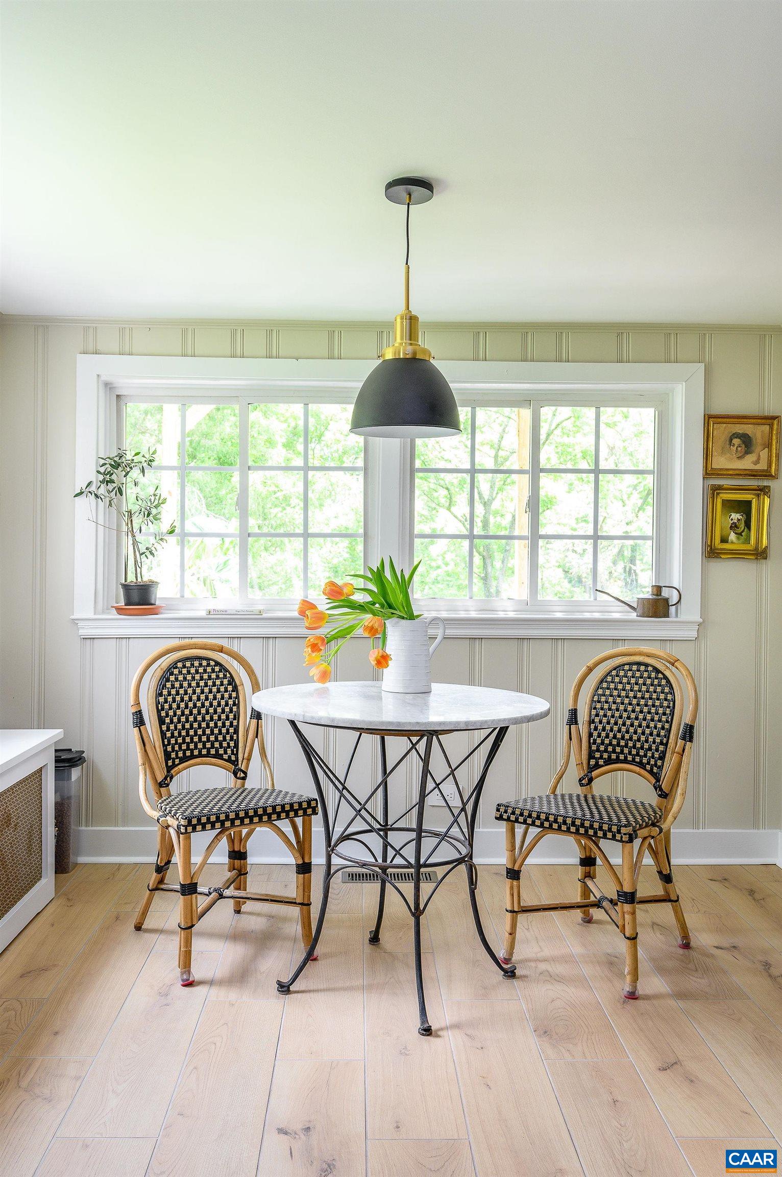 699 Ivy Depot Road Charlottesville, VA 22903 - Photo 12 of 55 a dining room with furniture and windows