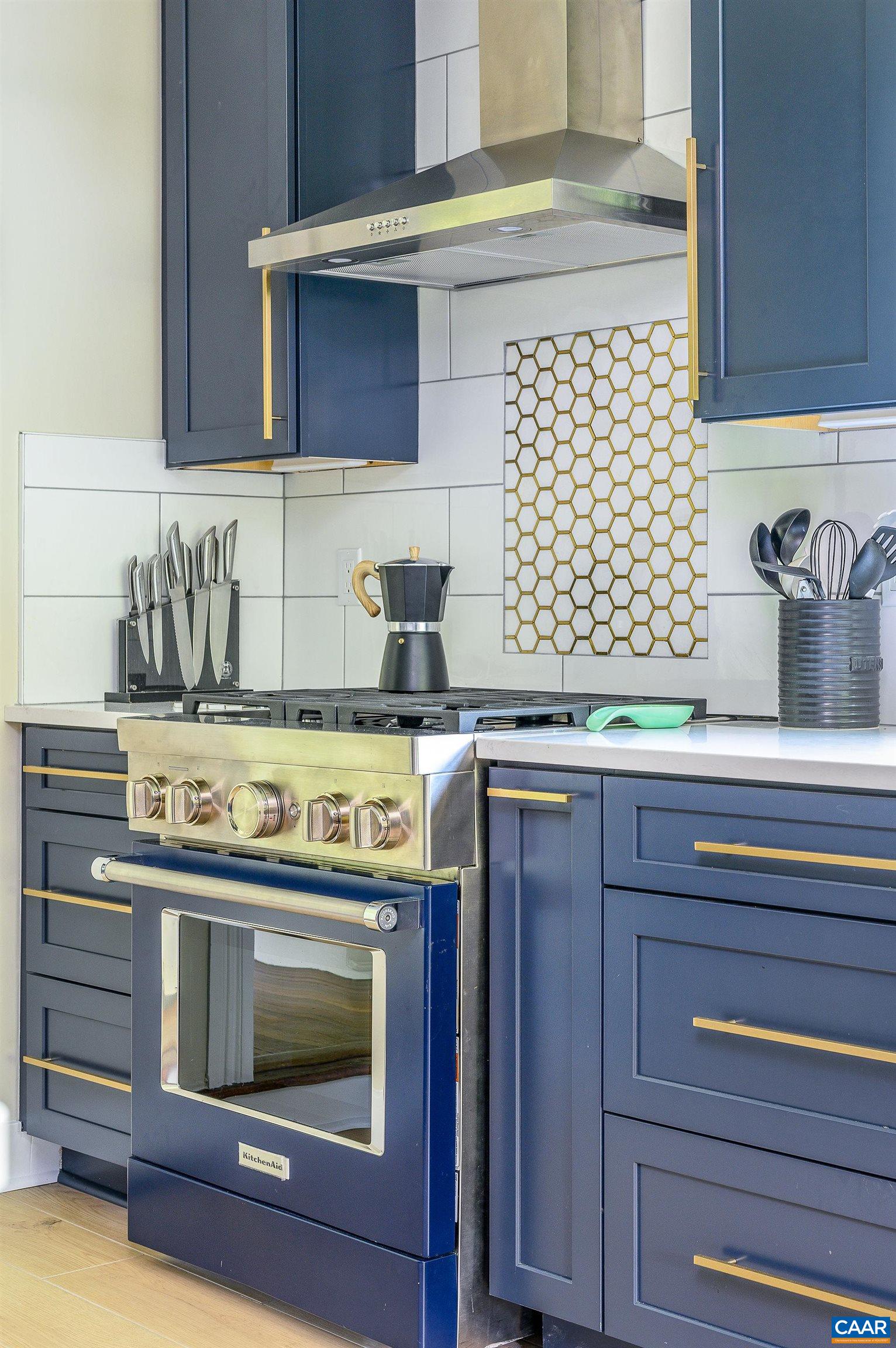 699 Ivy Depot Road Charlottesville, VA 22903 - Photo 13 of 55 a kitchen with a stove and cabinets