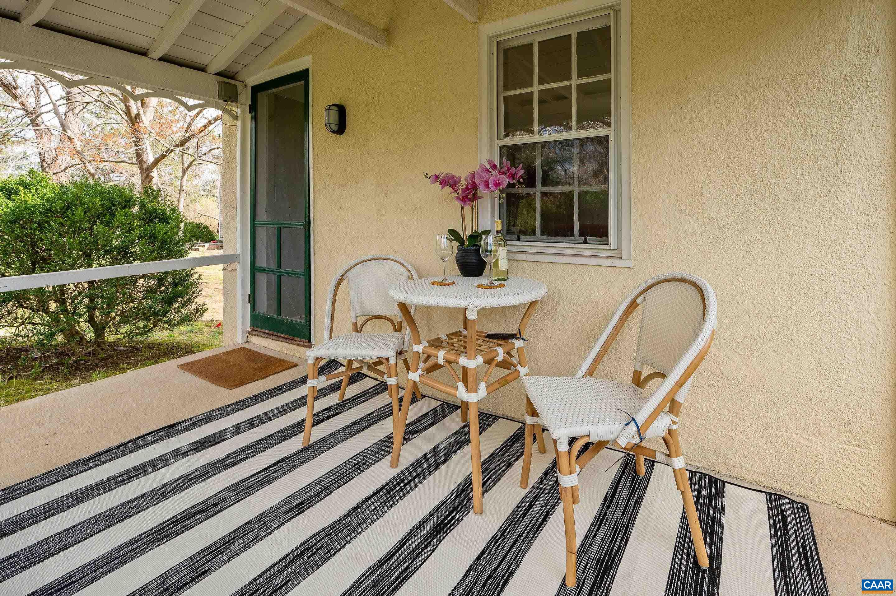 699 Ivy Depot Road Charlottesville, VA 22903 - Photo 40 of 55 a view of a chairs and table in the balcony