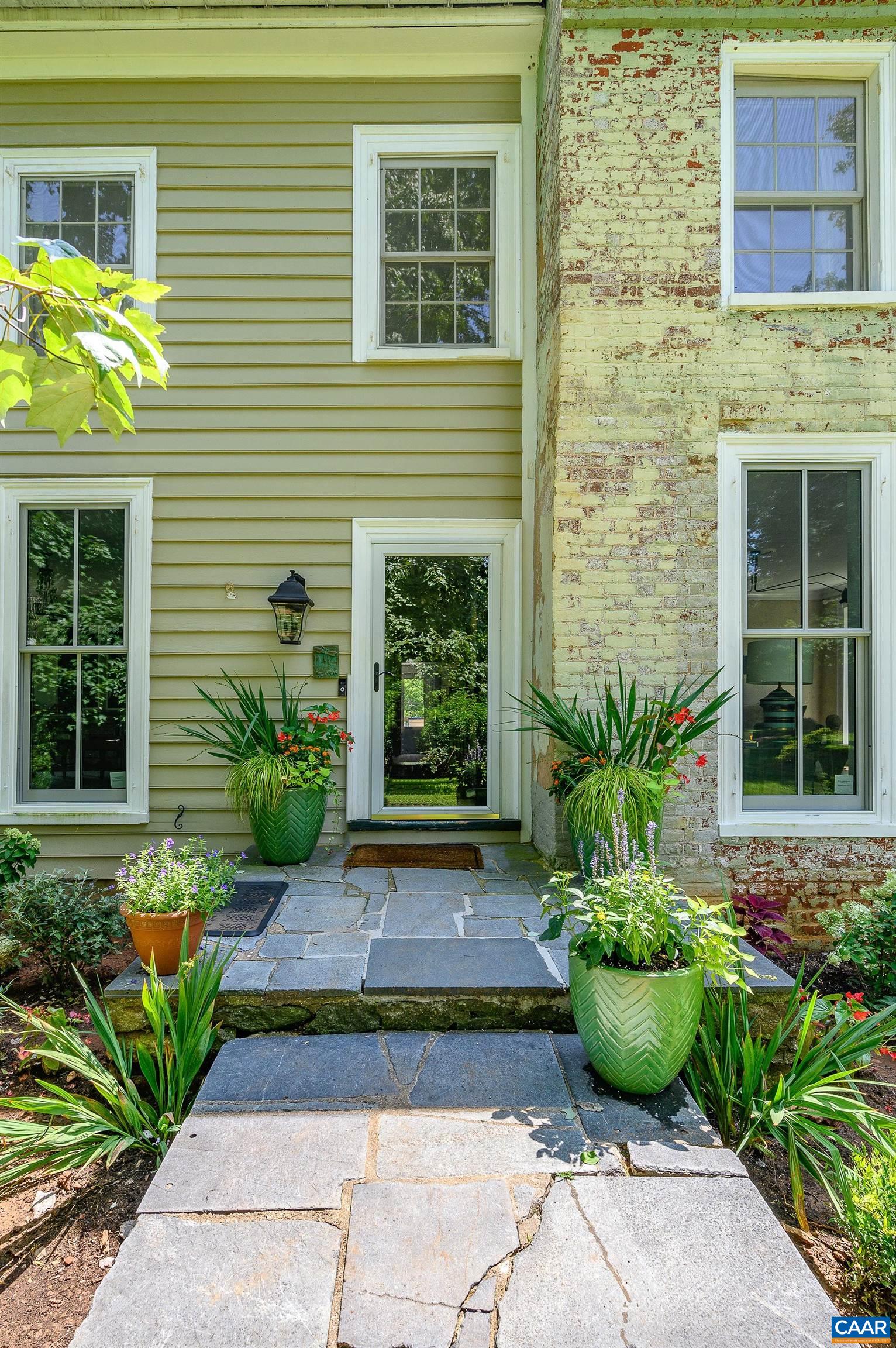 699 Ivy Depot Road Charlottesville, VA 22903 - Photo 4 of 55 a view of a backyard with plants