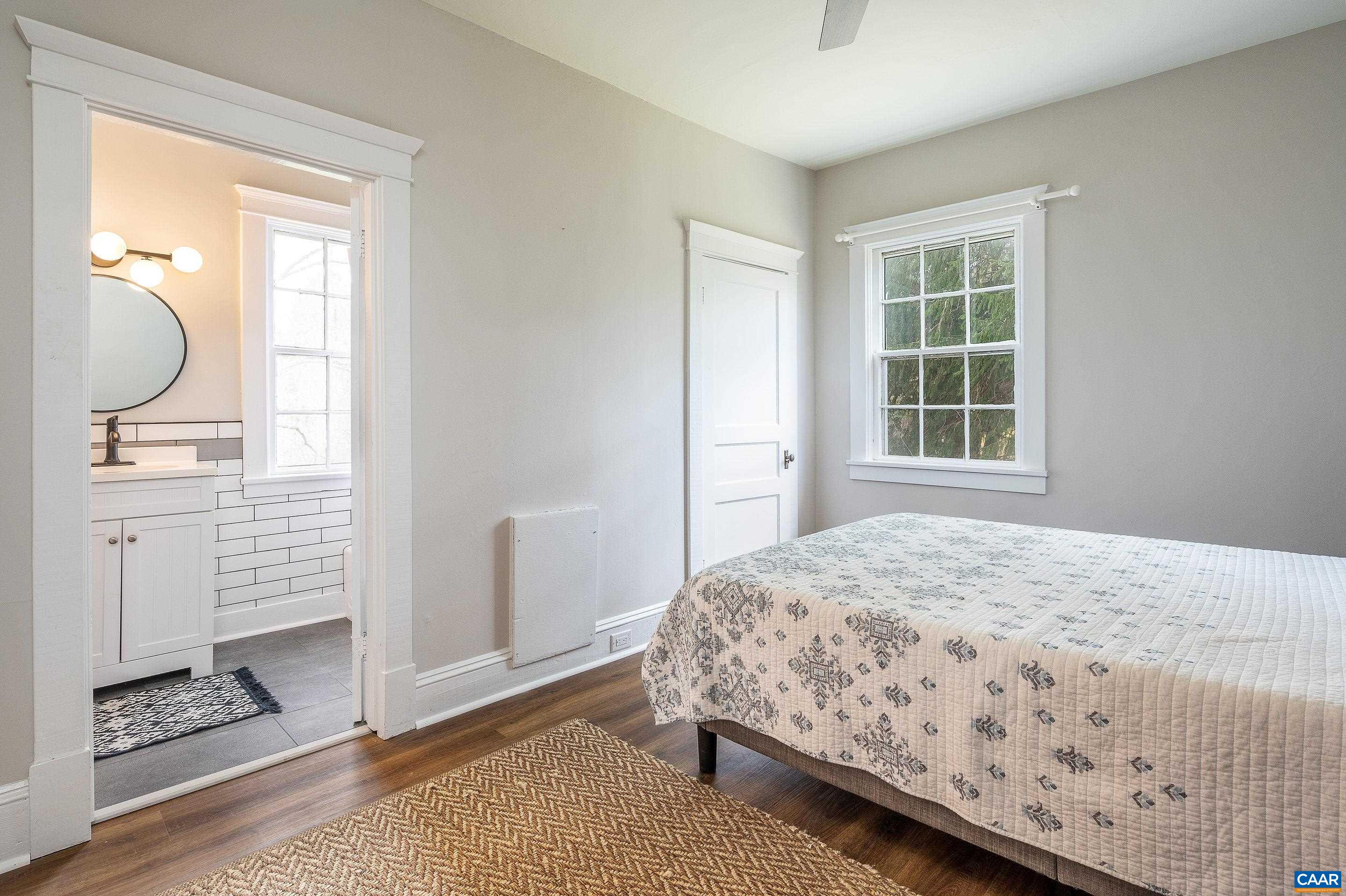 699 Ivy Depot Road Charlottesville, VA 22903 - Photo 45 of 55 a bedroom with a bed and a window