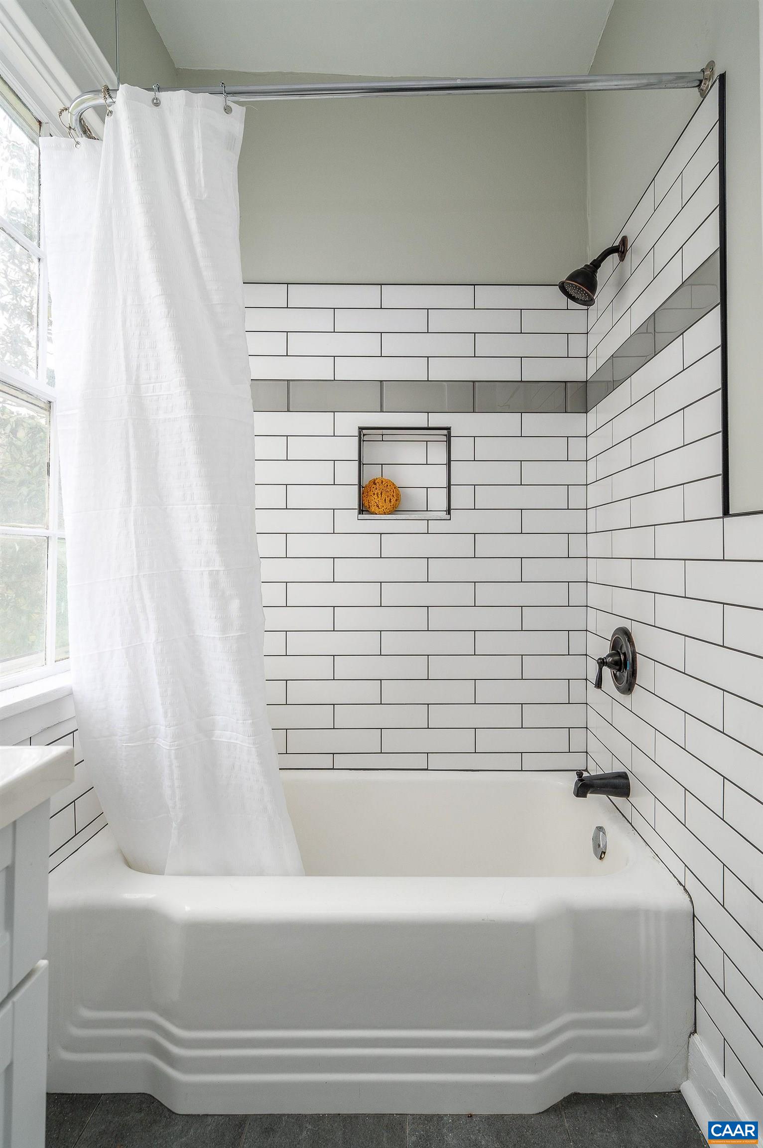 699 Ivy Depot Road Charlottesville, VA 22903 - Photo 47 of 55 a bathroom with a bathtub and shower