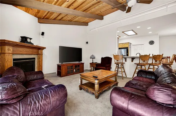 a kitchen with stainless steel appliances granite countertop a stove microwave and cabinets