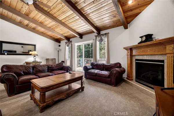 a kitchen with stainless steel appliances granite countertop a stove microwave and sink
