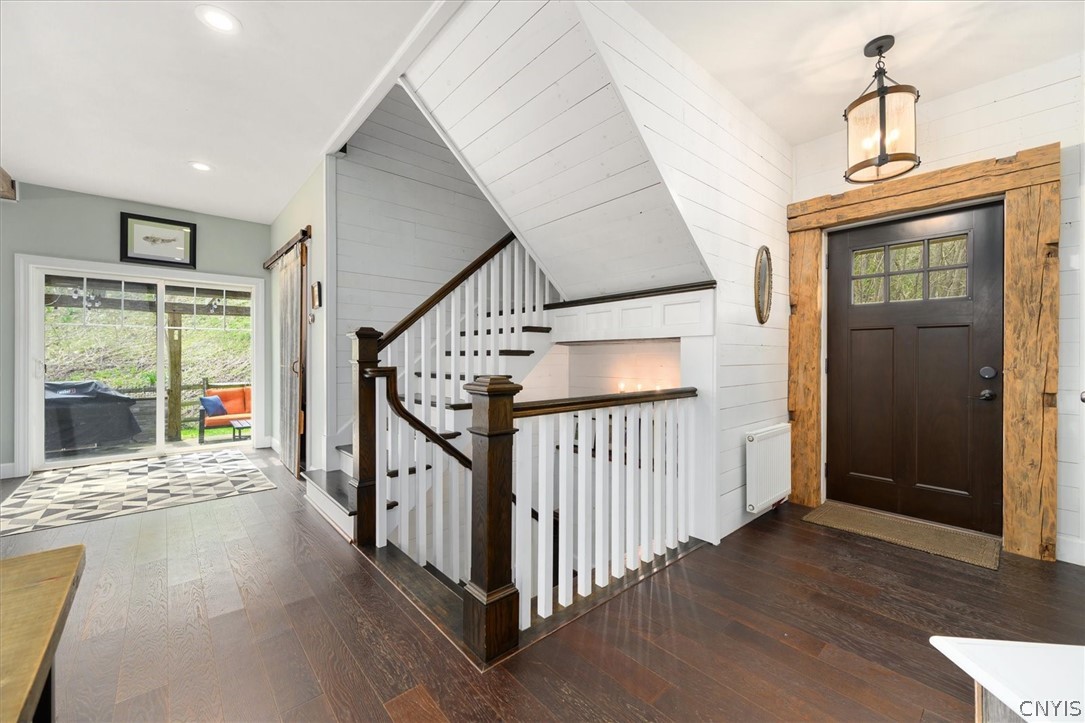 410 Tamarack Terrace Hamilton, NY 13346 - Photo 12 of 48 Entry way and staircases to ground and 2nd floor