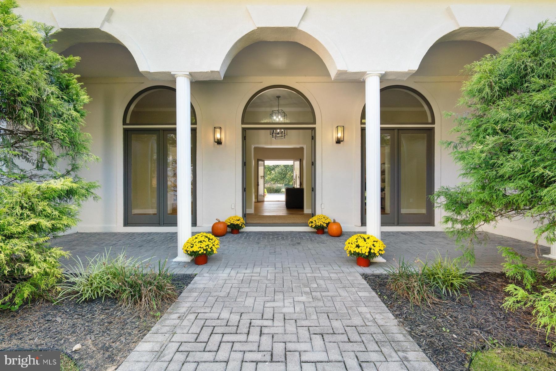 9171 Deepwater Point Road St. Michaels, MD 21663 - Photo 2 of 40 a front view of a house