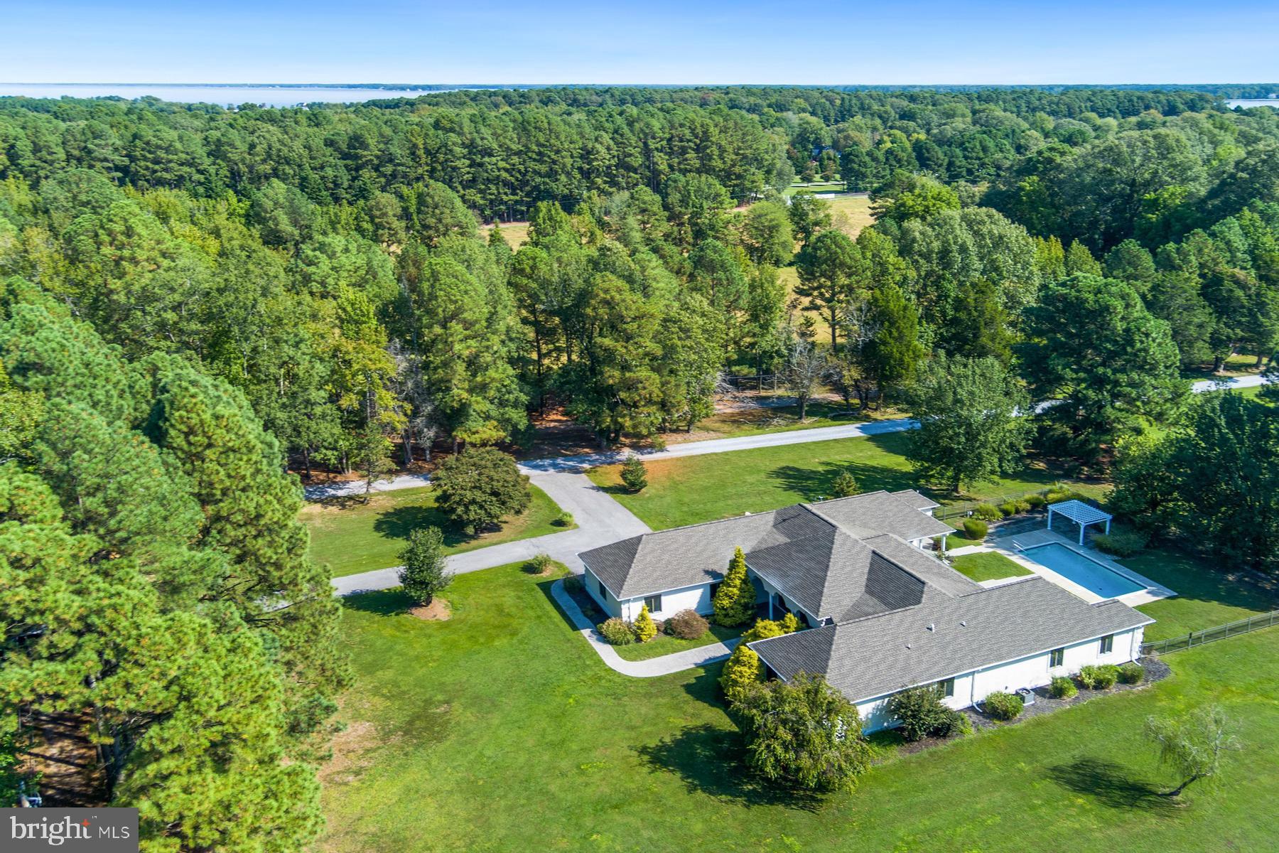 9171 Deepwater Point Road St. Michaels, MD 21663 - Photo 38 of 40 an aerial view of a house with garden