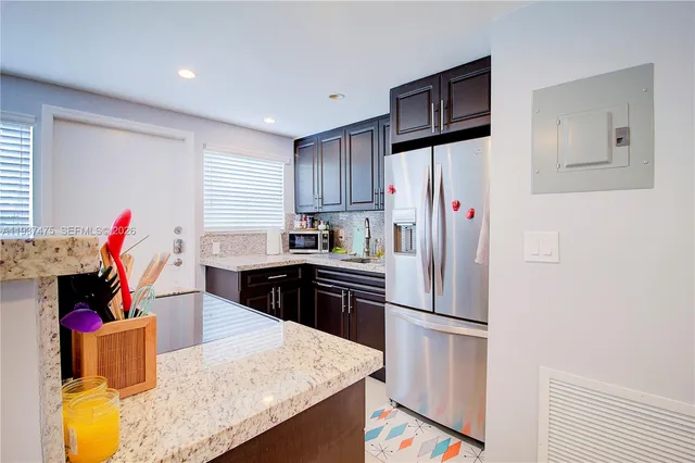 a bedroom with a bed and a table in it