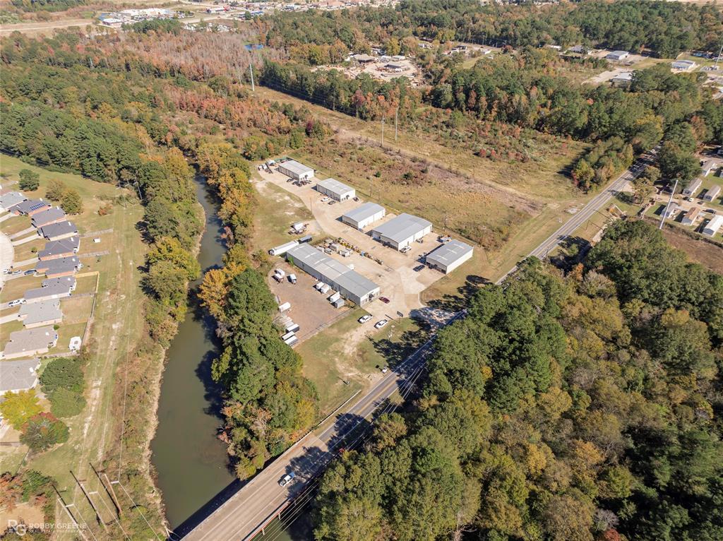 0 Flournoy Lucas Road Shreveport, LA 71106 - Photo 2 of 9 an aerial view of residential houses with outdoor space