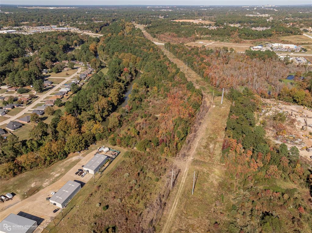 0 Flournoy Lucas Road Shreveport, LA 71106 - Photo 5 of 9 an aerial view of residential houses with outdoor space