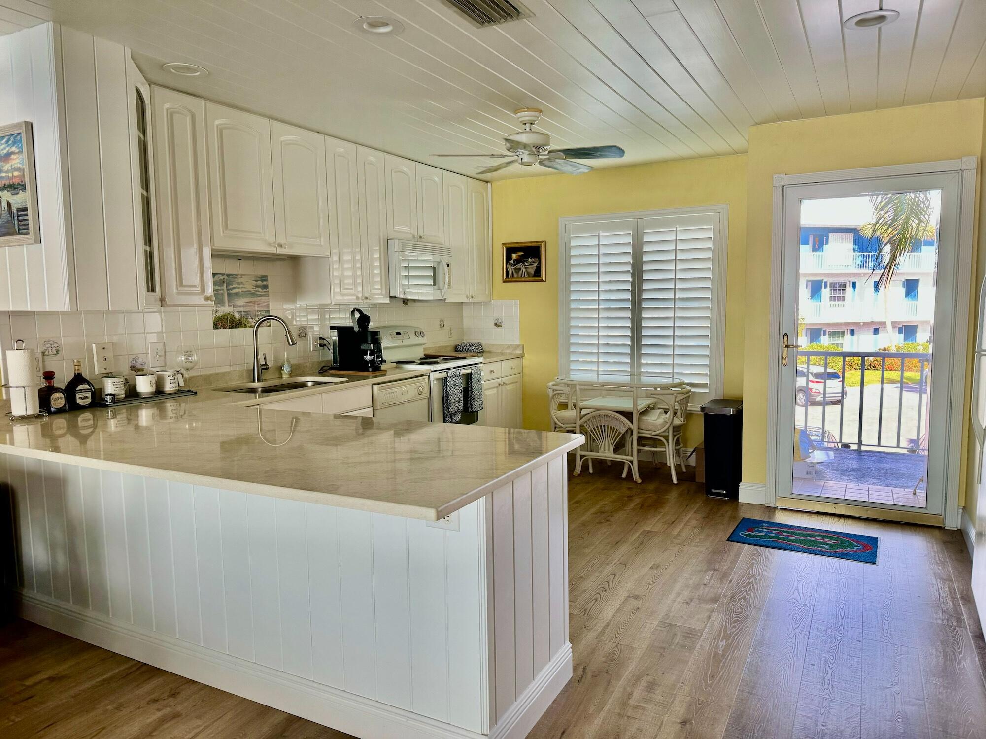 1868 Southwest Palm City Road, Unit 202 Stuart, FL 34994 - Photo 11 of 18 a kitchen with lots of counter top space