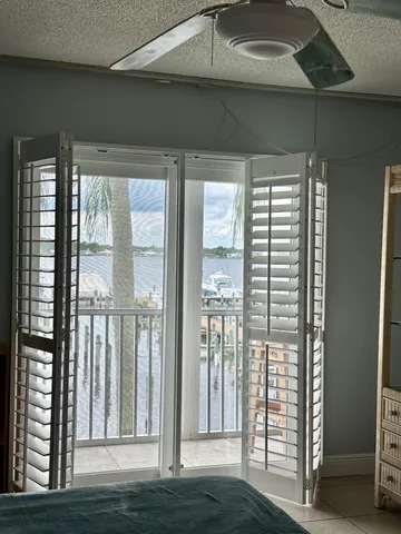 a view of front door and wooden floor