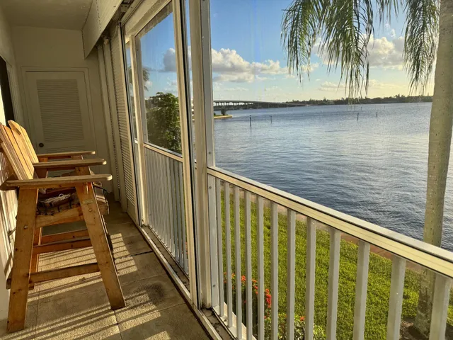 a view of a balcony with a ocean view