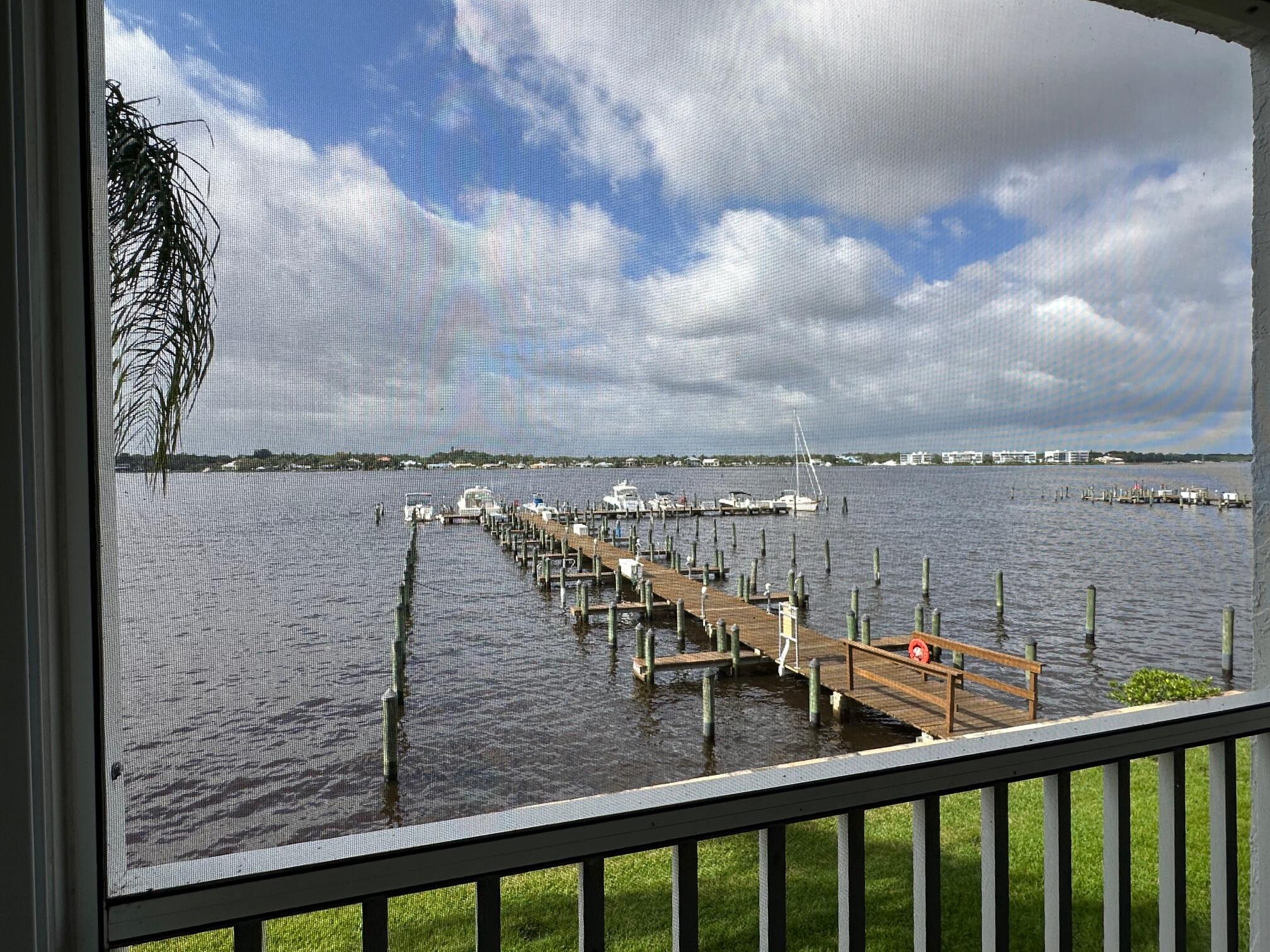1868 Southwest Palm City Road, Unit 202 Stuart, FL 34994 - Photo 4 of 18 a view of a balcony with city view