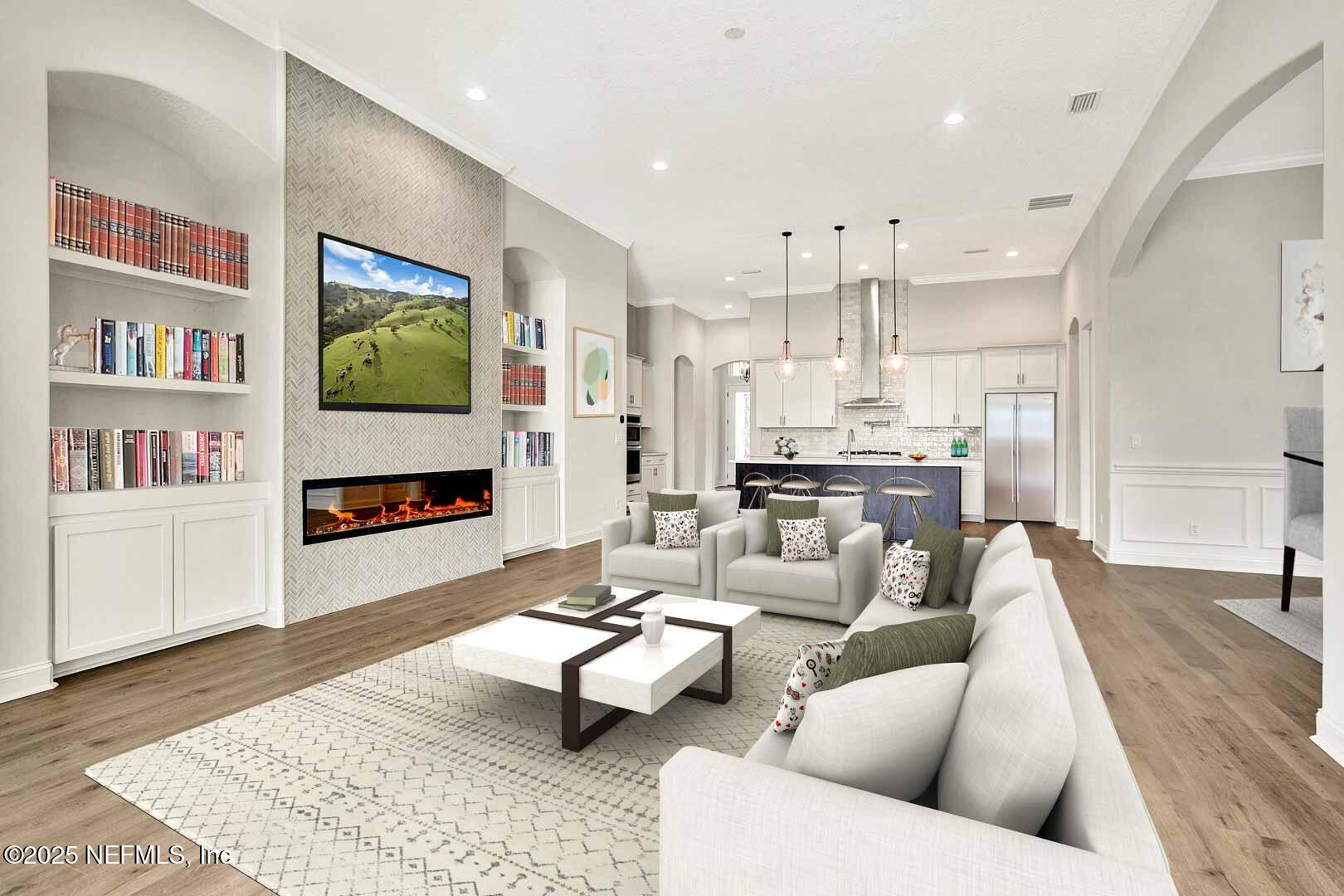 531 Eagle Moon Lake Drive St. Augustine, FL 32092 - Photo 35 of 36 a living room with furniture and a fireplace