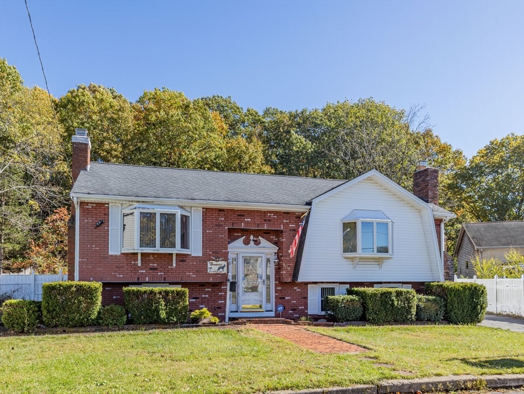 109 Merryknoll Road Weymouth, MA 02191 - Photo 1 of 41 a front view of a house with garden
