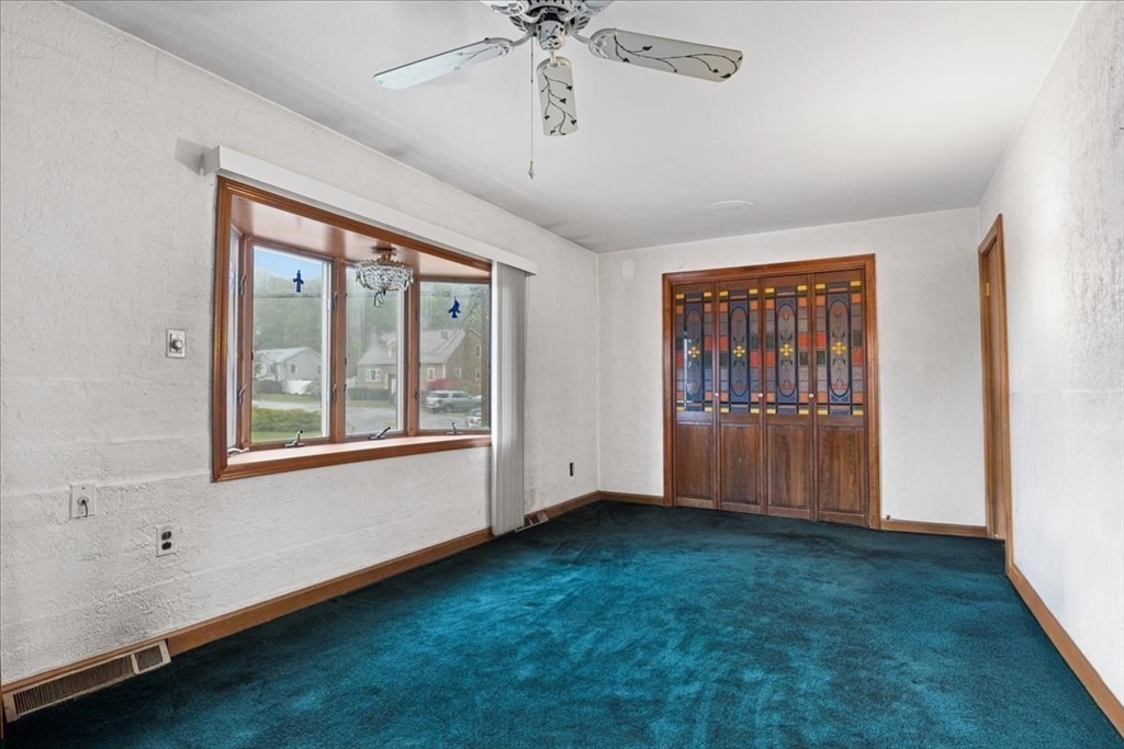109 Merryknoll Road Weymouth, MA 02191 - Photo 13 of 41 a view of an empty room with a window