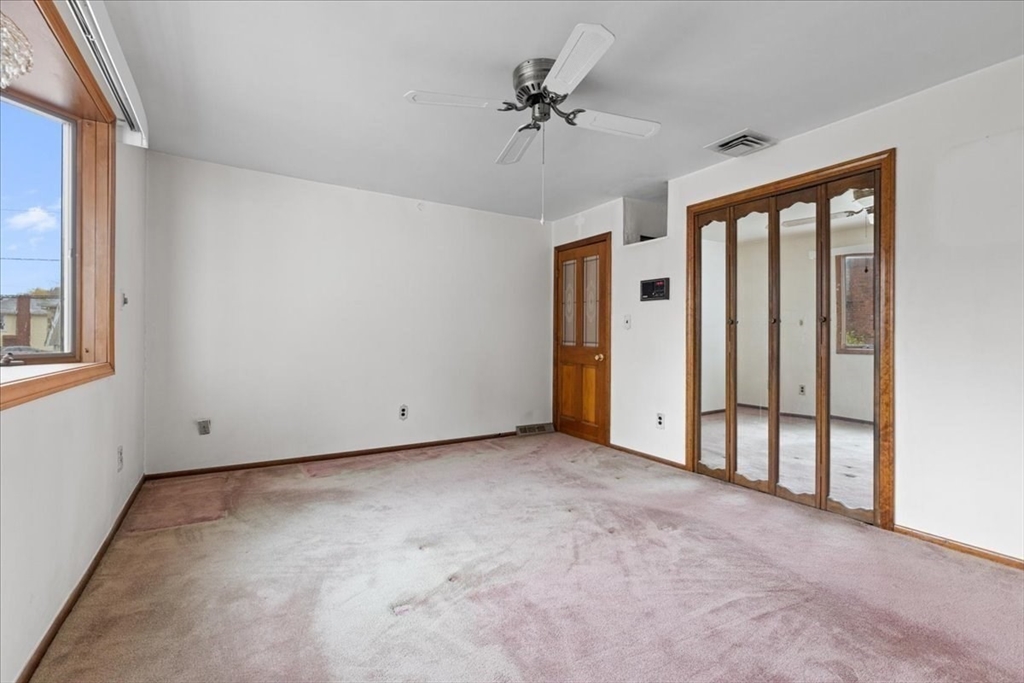 109 Merryknoll Road Weymouth, MA 02191 - Photo 15 of 41 a view of an empty room with a window