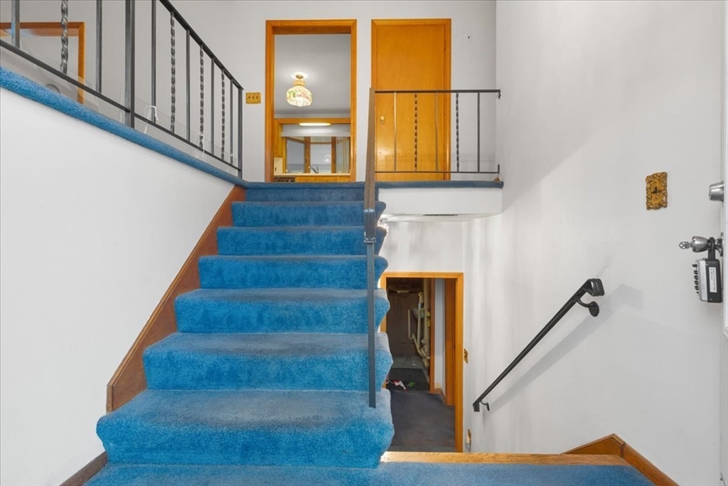 109 Merryknoll Road Weymouth, MA 02191 - Photo 3 of 41 a view of entryway and hall with wooden floor
