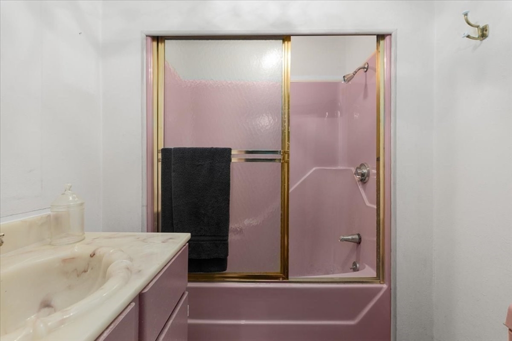 109 Merryknoll Road Weymouth, MA 02191 - Photo 33 of 41 a bathroom with a shower and a sink