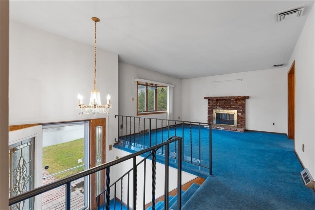 109 Merryknoll Road Weymouth, MA 02191 - Photo 7 of 41 a view of an entryway with wooden floor