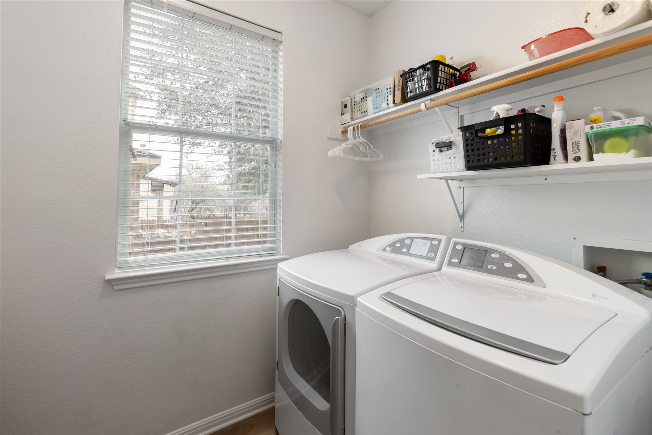 4525 Three Arrows Court Cedar Park, TX 78613 - Photo 27 of 32 Laundry room with storage