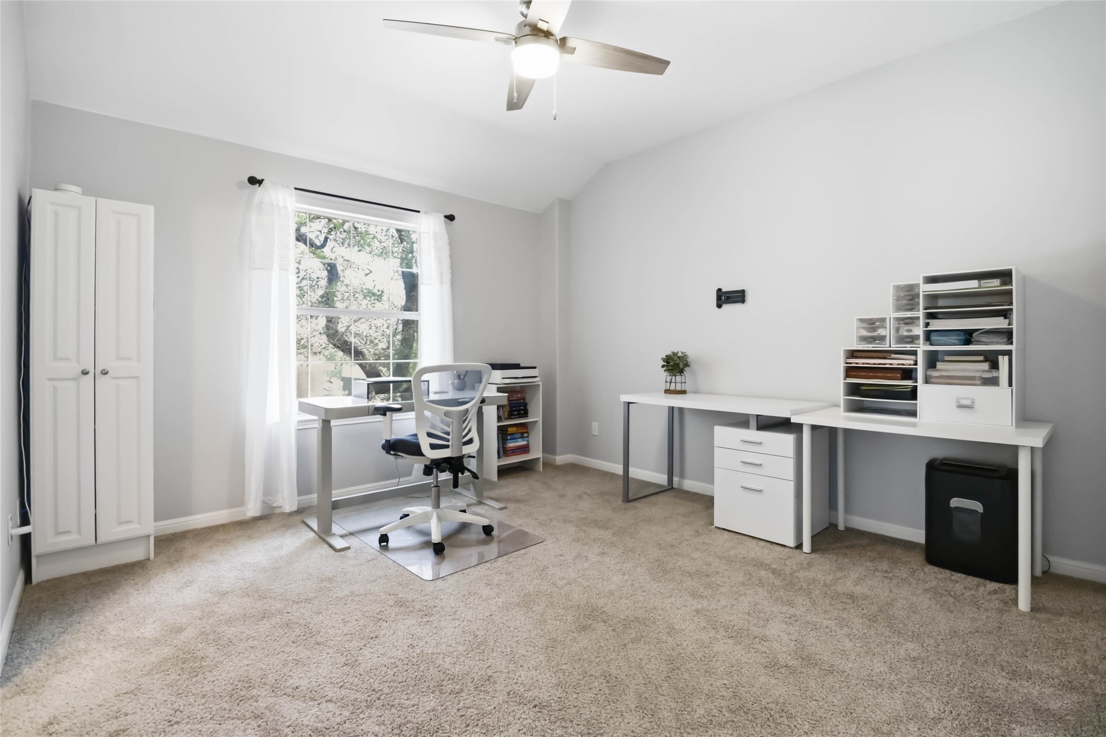 4525 Three Arrows Court Cedar Park, TX 78613 - Photo 31 of 32 Office space featuring light carpet, vaulted ceiling, and a ceiling fan