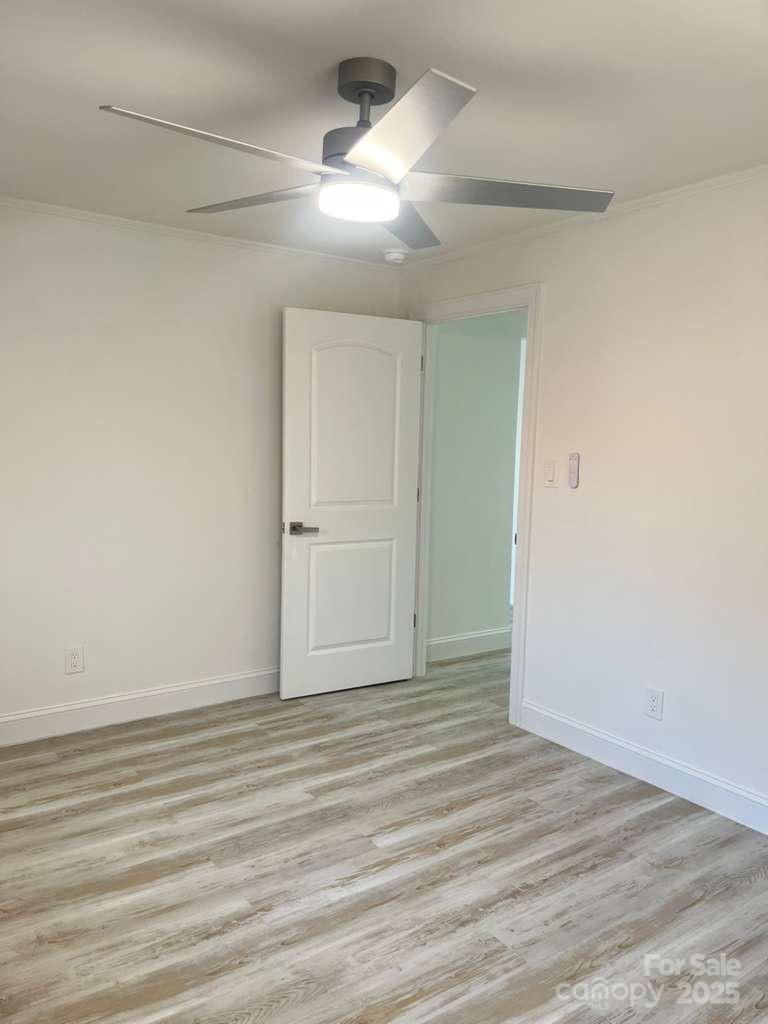 1073 Springdale Drive Maiden, NC 28650 - Photo 13 of 33 wooden floor in an empty room