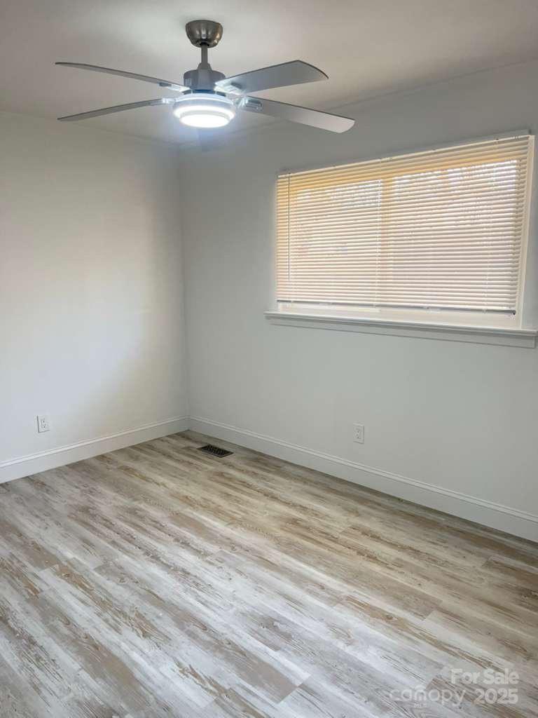 1073 Springdale Drive Maiden, NC 28650 - Photo 16 of 33 a view of an empty room with a window