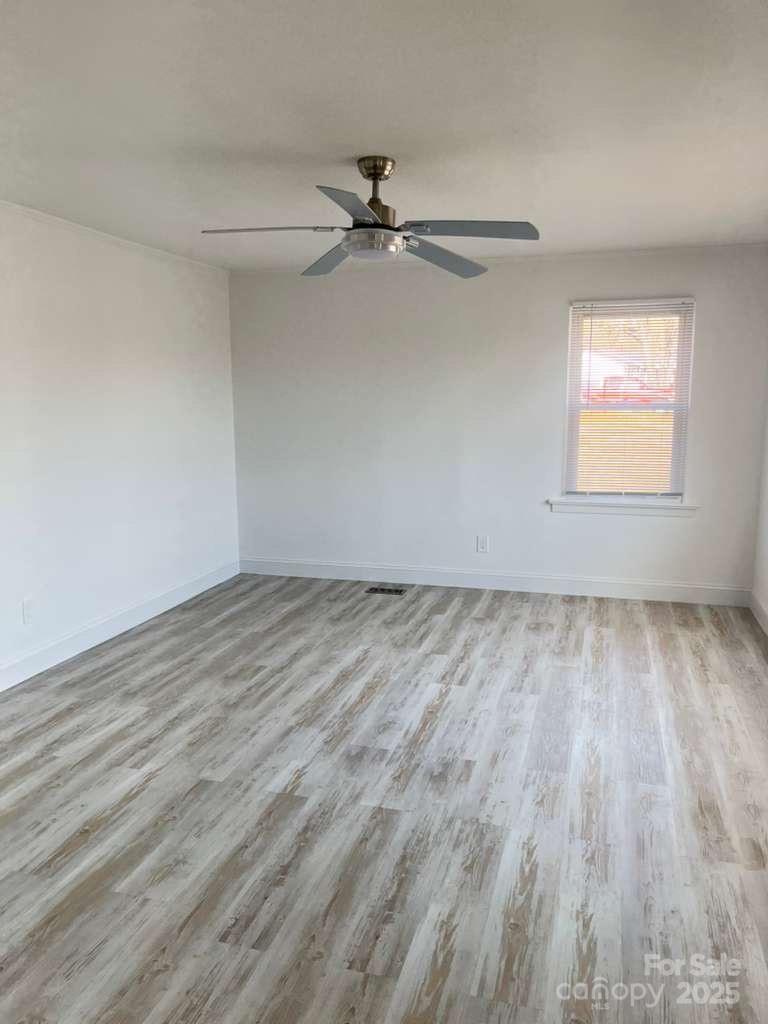 1073 Springdale Drive Maiden, NC 28650 - Photo 19 of 33 wooden floor in an empty room