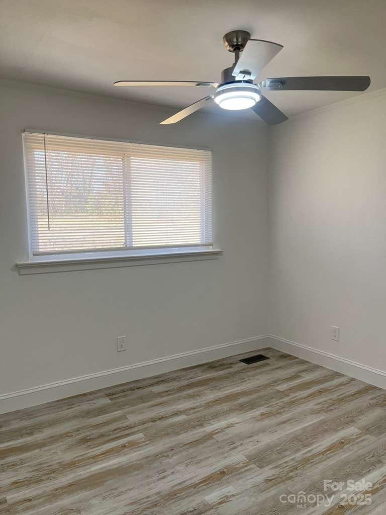 1073 Springdale Drive Maiden, NC 28650 - Photo 23 of 33 an empty room with a window