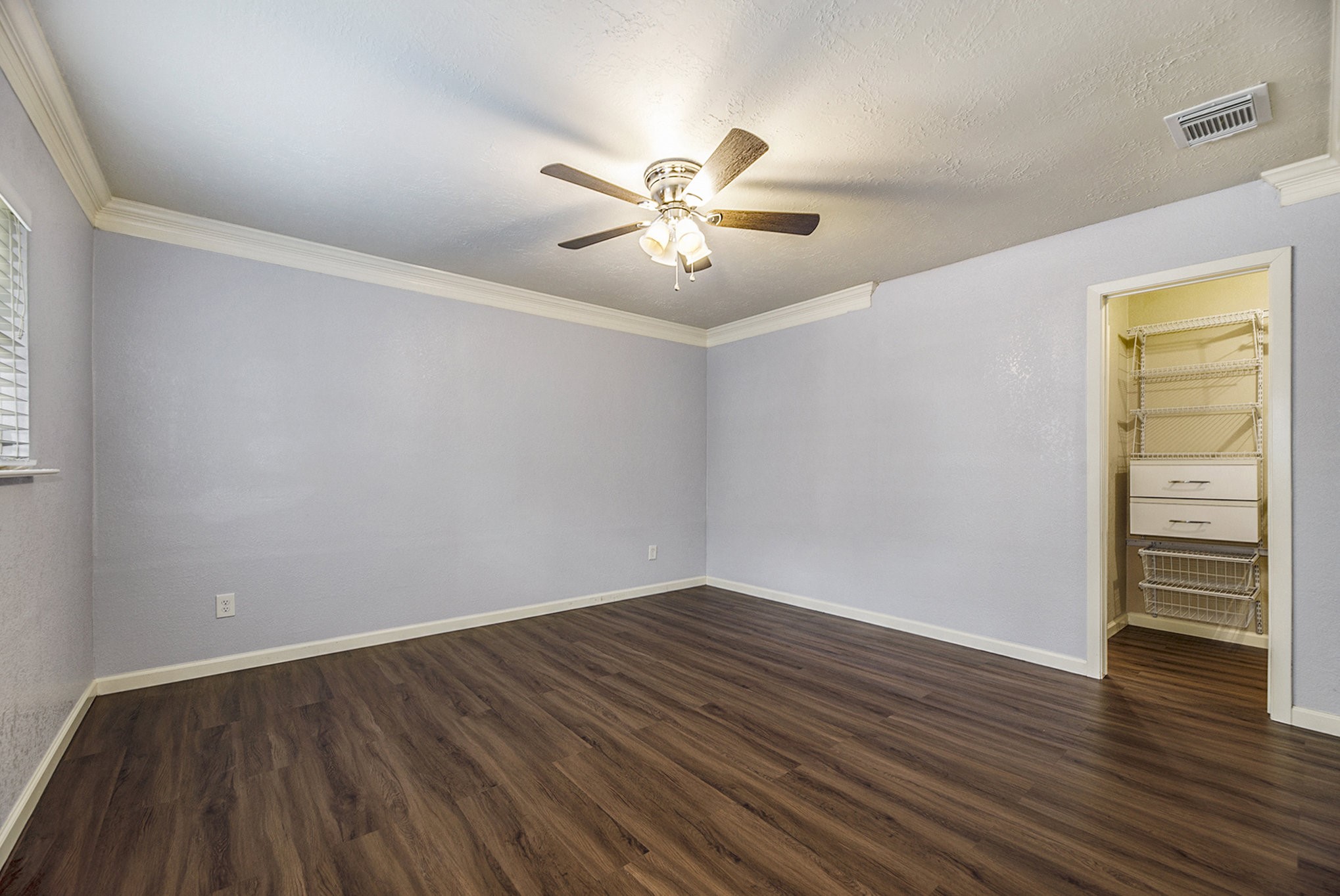 2539 Cobblers Way Friendswood, TX 77546 - Photo 12 of 19 wooden floor in an empty room with a window