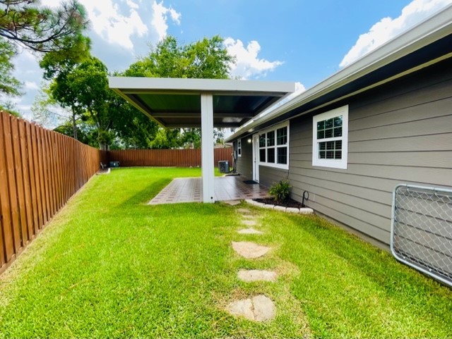 2539 Cobblers Way Friendswood, TX 77546 - Photo 19 of 19 a view of a house with backyard and porch