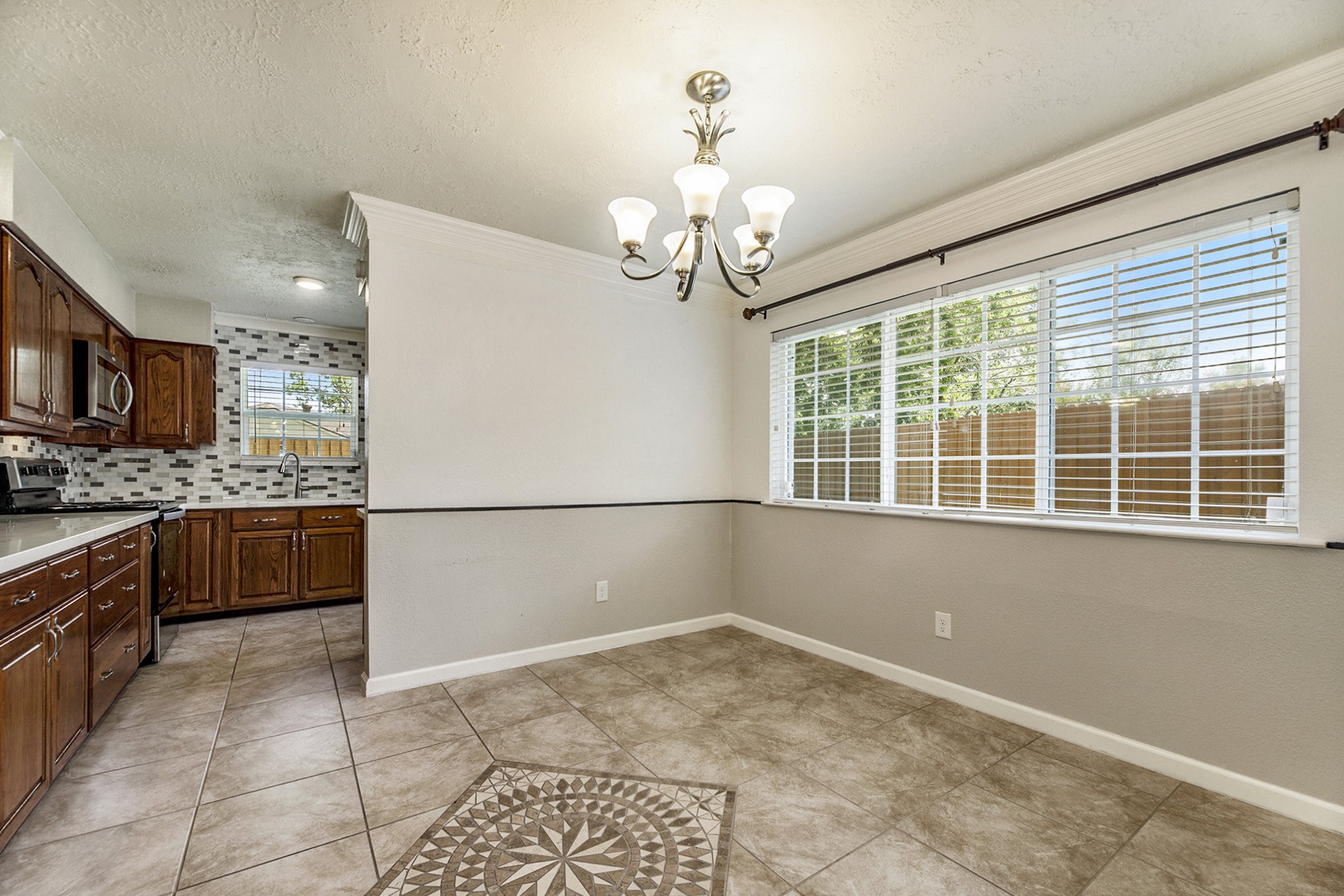2539 Cobblers Way Friendswood, TX 77546 - Photo 7 of 19 a view of kitchen with granite countertop cabinets and refrigerator