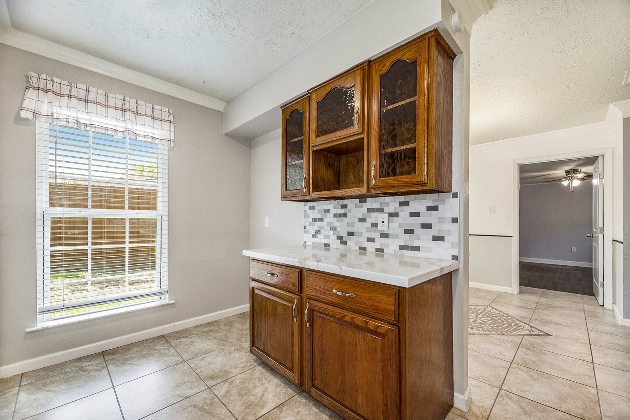 2539 Cobblers Way Friendswood, TX 77546 - Photo 10 of 19 a kitchen with granite countertop cabinets and a window