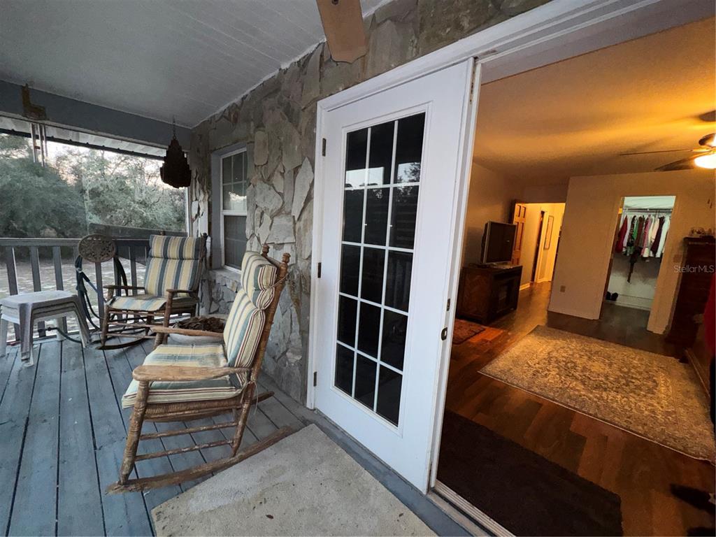 2134 R E Byrd Road Frostproof, FL 33843 - Photo 11 of 54 a view of living room and balcony