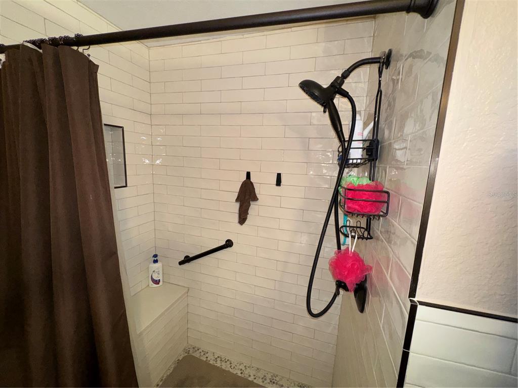 2134 R E Byrd Road Frostproof, FL 33843 - Photo 17 of 54 a bathroom with a shower