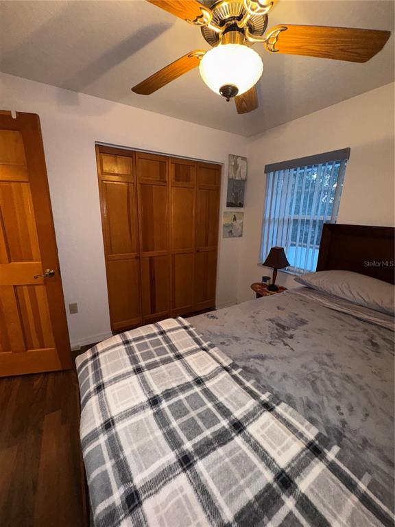 2134 R E Byrd Road Frostproof, FL 33843 - Photo 25 of 54 a bedroom with a bed and a mirror