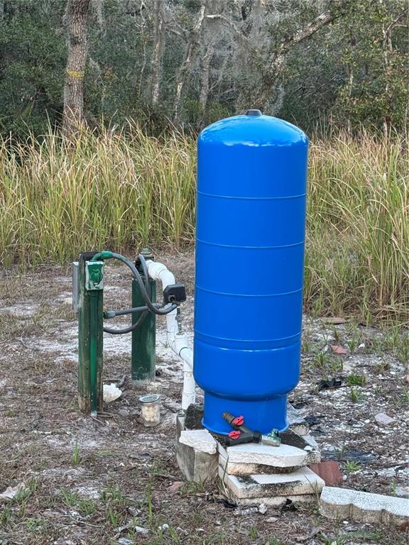 2134 R E Byrd Road Frostproof, FL 33843 - Photo 31 of 54 a front view of a house with a yard