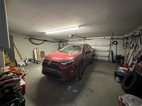 a view of storage and utility room with washer and dryer