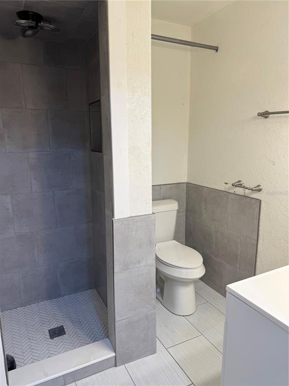 2134 R E Byrd Road Frostproof, FL 33843 - Photo 38 of 54 a white toilet sitting next to a bathroom sink