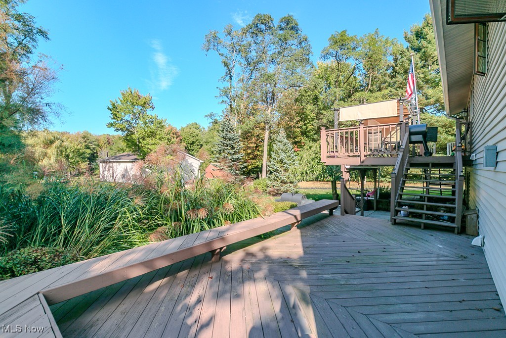 12745 Carter Road Painesville, OH 44077 - Photo 19 of 50 Wooden terrace with stairway