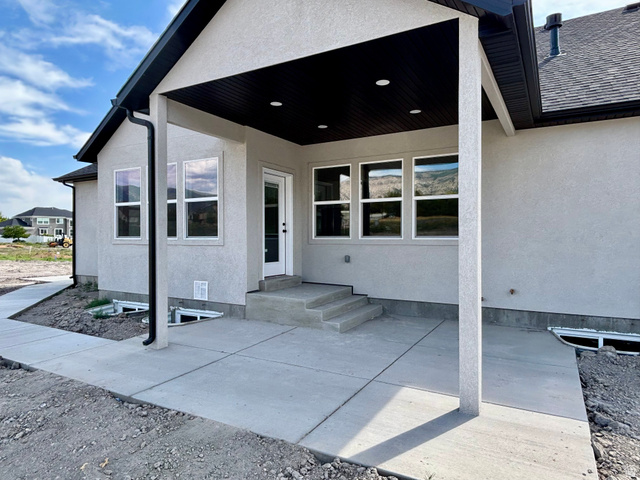 1184 West 3250 North Ogden, UT 84414 - Photo 6 of 69 Covered patio featuring recessed lighting. Walkway from RV pad to covered patio