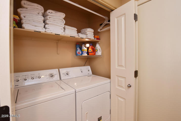 7641 East Indian Bend Road Scottsdale, AZ 85250 - Photo 15 of 19 a utility room with dryer and washer