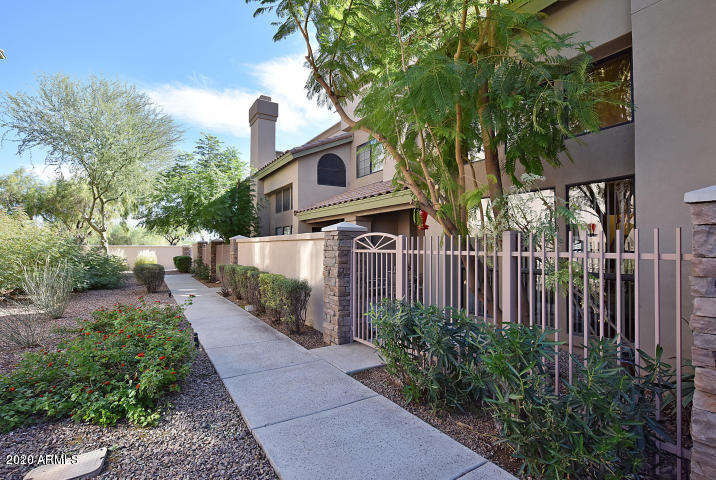 7641 East Indian Bend Road Scottsdale, AZ 85250 - Photo 19 of 19 a front view of a house with garden