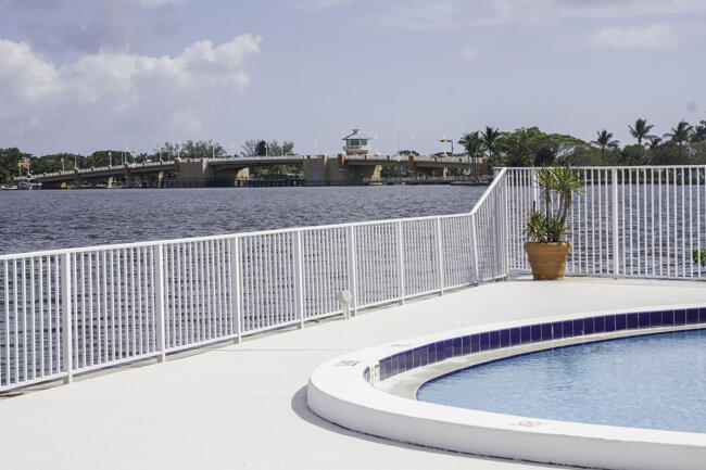 301 Croton Avenue, Unit 201 Lantana, FL 33462 - Photo 15 of 16 a view of a swimming pool with a terrace