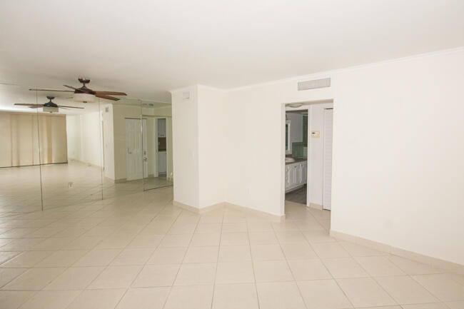 301 Croton Avenue, Unit 201 Lantana, FL 33462 - Photo 6 of 16 an empty room with a bathroom