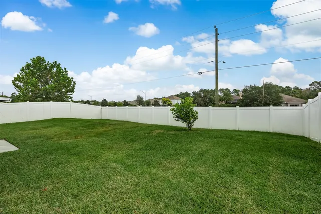 a view of yard with a play ground