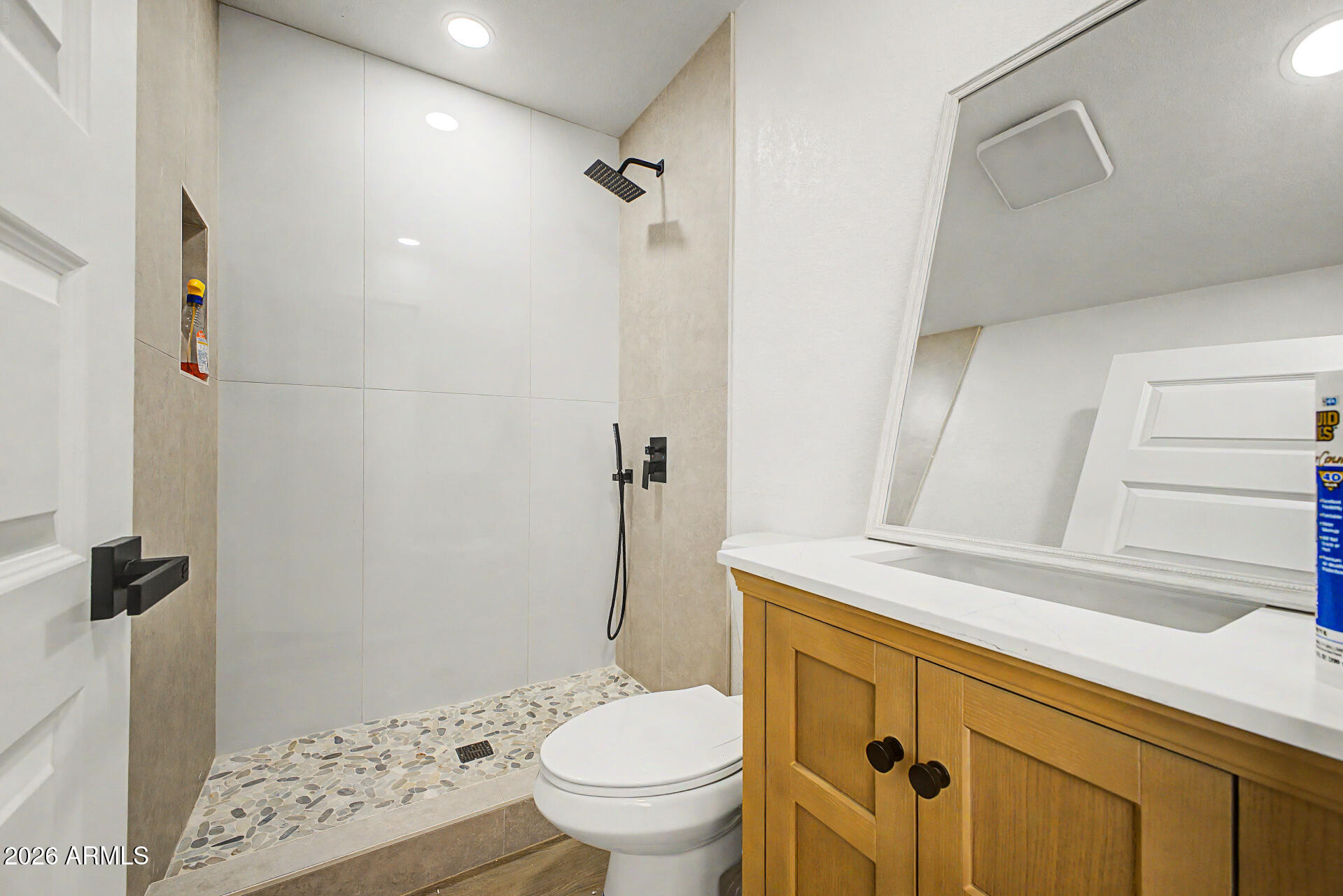 7214 West Flower Street Phoenix, AZ 85033 - Photo 15 of 29 a bathroom with a granite countertop sink toilet and shower